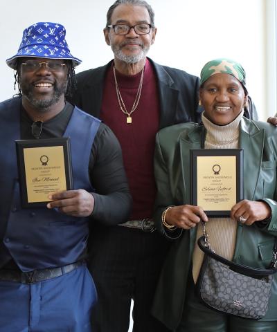 Formerly incarcerated advocates and practitioners pose with awards at our Bronx Community Solutions' reentry forum and resource fair.