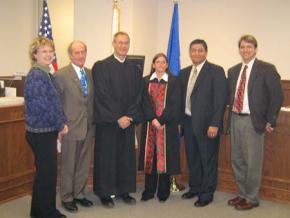 Sen. Mary A. Olson (DFL), Rep. Larry Howes (R), Judge John P. Smith, Judge Korey Wahwassuck, Leech Lake Tribal Chairman George Goggleye, Jr., and Rep. Frank Moe (DFL) at the February 23, 2007 ceremony installing the Leech Lake Tribal Flag in Cass County D