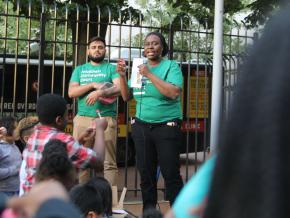 Staff speaking to an audience about the importance of safety