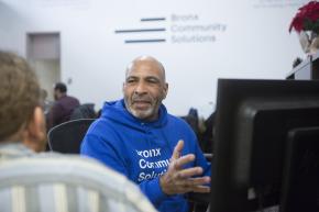 Intake specialist works with a participant at our Bronx Community Solutions' office.