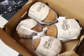 Thanksgiving turkeys wrapped for Queens giveaway.