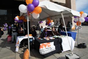 City agencies and service providers table at RISE's Domestic Violence Awareness Month resource fair.