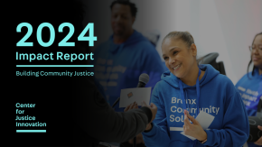 "2024 Impact Report: Building Community Justice" in blue font over photo of woman in Bronx Community Solutions sweater handing out cards.